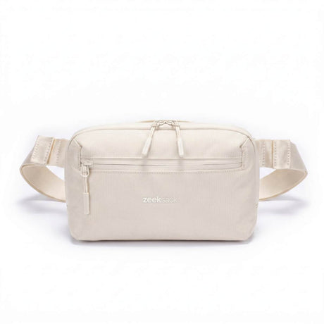 Zeeksack Crossbody Organizer (hiekanbeige) – olkahihna ja vetoketjullinen etutasku.