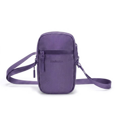Zeeksack Travel Pouch (violetti) – olkahihna ja vetoketjullinen etutasku.
